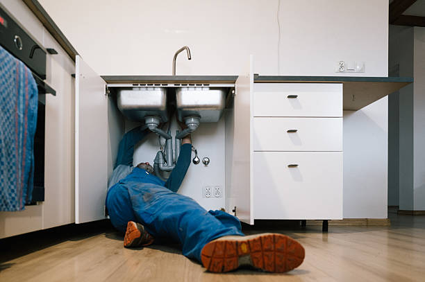 Professional Drain Cleaning technician working in Muir, MI